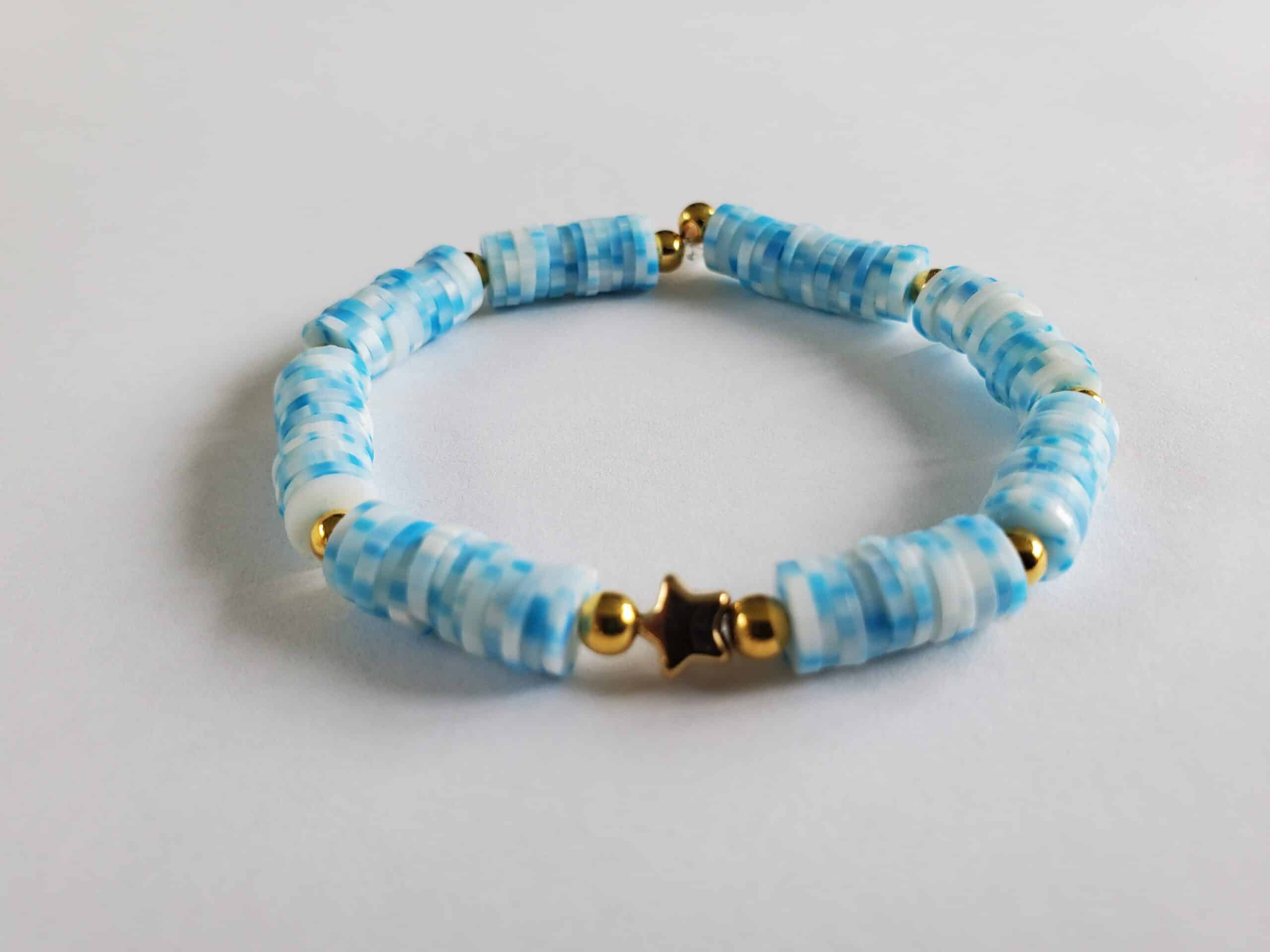 Blue and White Clay Bead Bracelet  Bracelets handmade beaded, Beaded  bracelets, Clay bead necklace